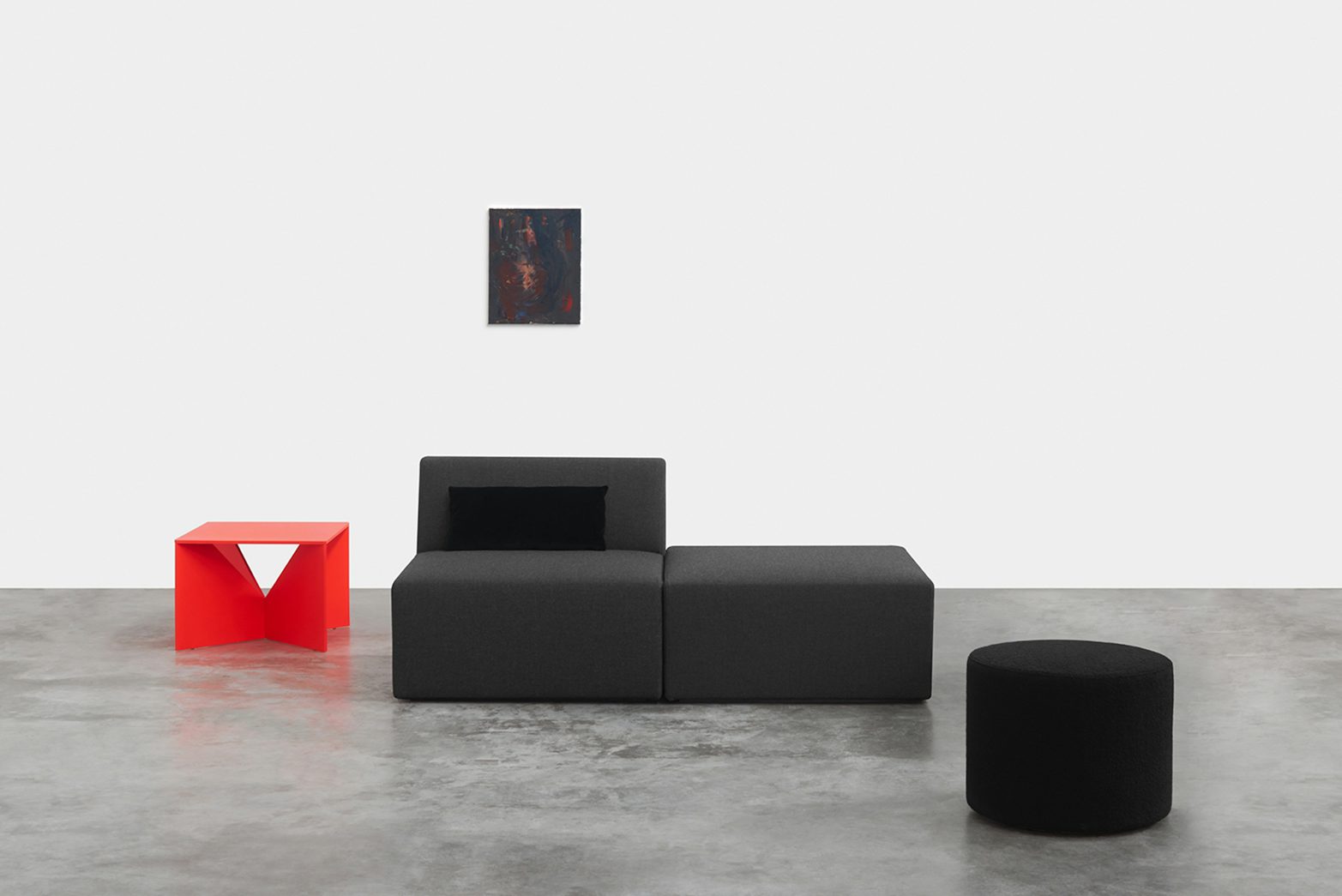 e15 red calvert table with kerman sofa and pouf