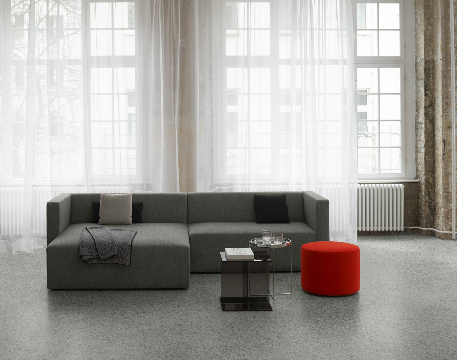 drei table with kerman sofa and habibi table in large modern room e15 furniture