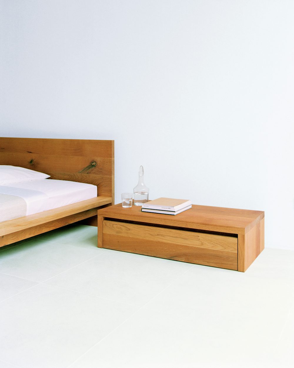 e15 emil bedside table with mo bed