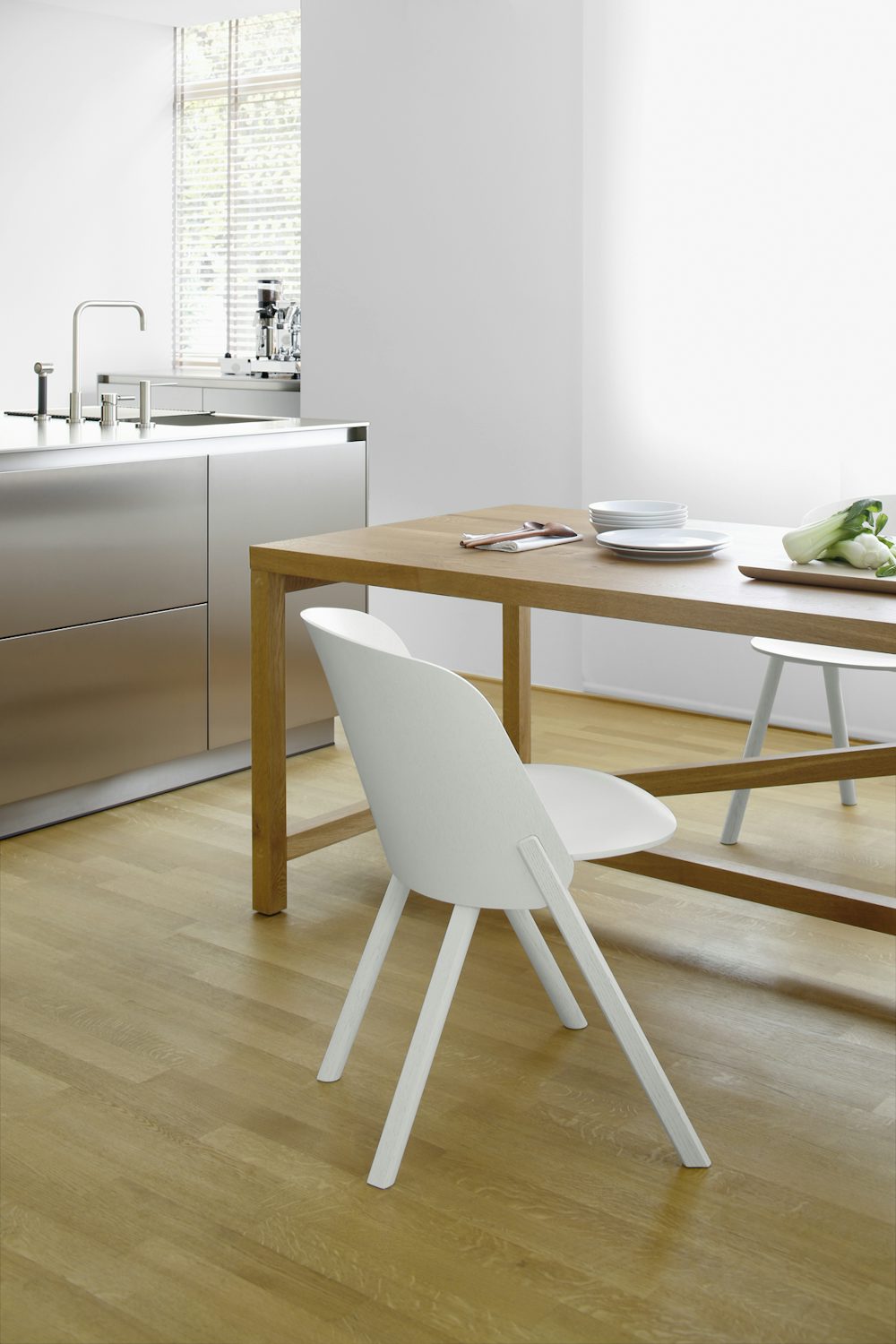 e15 platz table in kitchen in oiled oak with this side chair in whtie