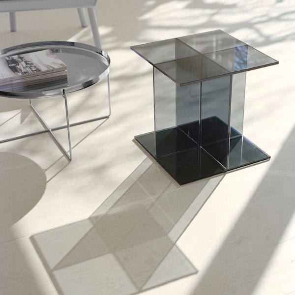 e15 vier side table in smoke grey with habibi side table in stainless steel